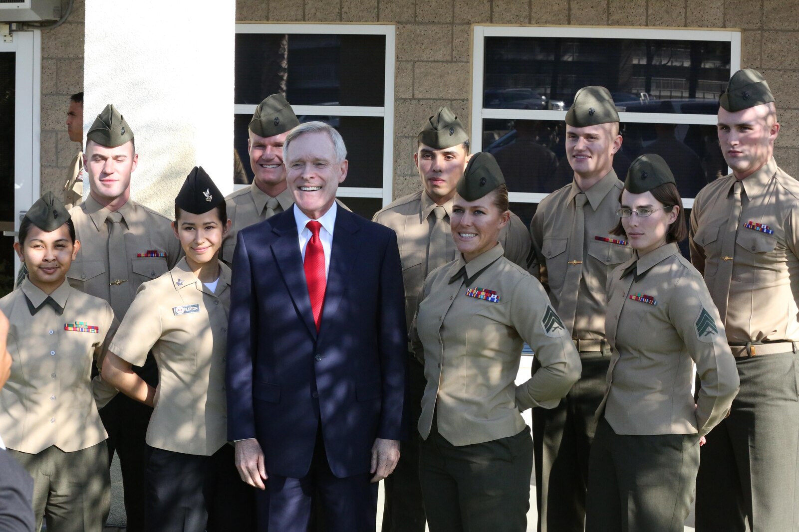 Secretary of the Navy Ray Mabus, poses with a group of Marines aboard Camp Pendleton, Calif., Jan. 10. Mabus had lunch with a group of non-commissioned officers to discuss questions and concerns they had regarding the Marine Corps.