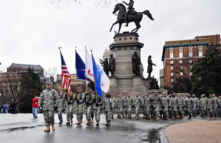 Soldiers from the Virginia Army National Guard and Airmen from the Virginia Air National Guard provide the lead element for the parade following the Inauguration of Virginia’s 72nd Governor Jan. 11, 2014, in Richmond, Va.