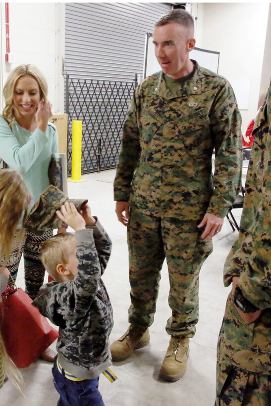 Lt. Col. Brian Russell, the commanding officer of 1st Air Naval Gunfire Liaison Company, welcomes the Daggett family to ANGLICOs town hall meeting aboard Camp Pendleton, Calif., Jan 15. The meeting allowed families to ask questions and get a better sense of ANGLICO’s structure and purpose.
