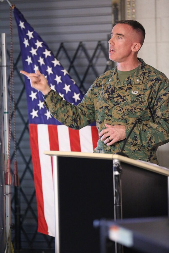 Lt. Col. Brian Russell, the commanding officer of 1st Air Naval Gunfire Liaison Company, speaks to Marines and families at a town hall meeting aboard Camp Pendleton, Calif., Jan 15. The meeting allowed families to ask questions and get a better sense of ANGLICO’s structure and purpose.