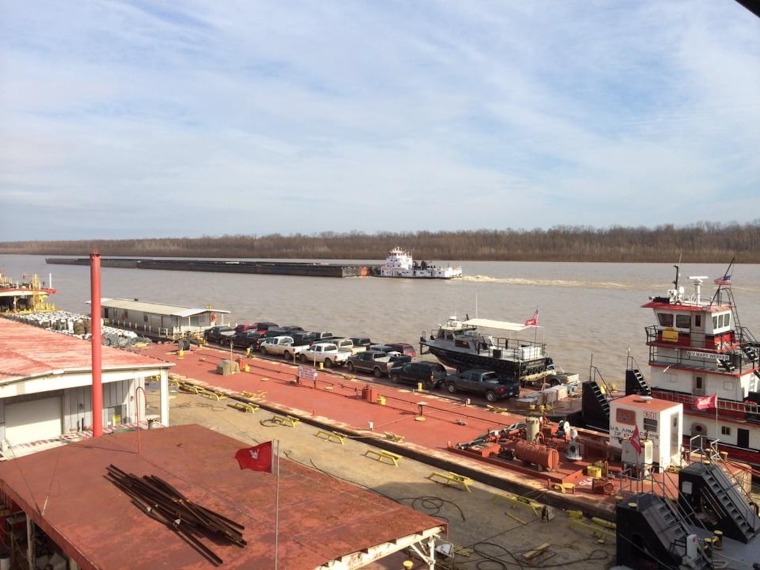 The Vicksburg District's Mat Sinking unit Leaves for Unscheduled Repairs at a site north of St Luis, MO.