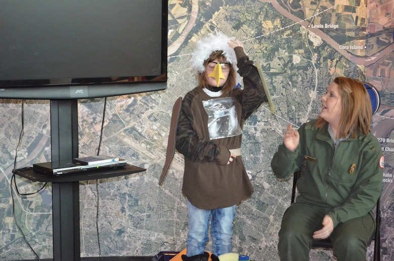 A Girl Scout dresses up as an eagle during the 2014 Scouting for Eagles event January 18, 2014 at the National Great Rivers Museum in Alton, Ill. 
