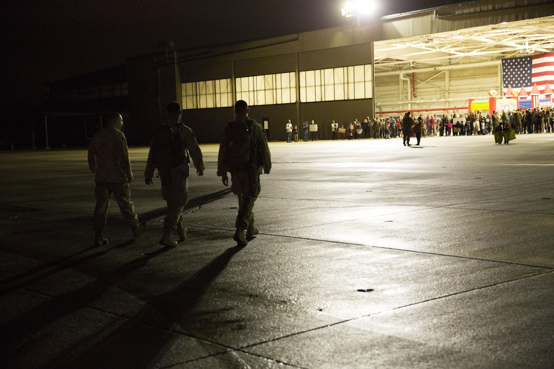 Marines with Marine Aviation Logistics Squadron 31 see their families for the first time after a deployment, Jan. 10. The Marines were attached to MALS-40 for the six-month deployment to Afghanistan.