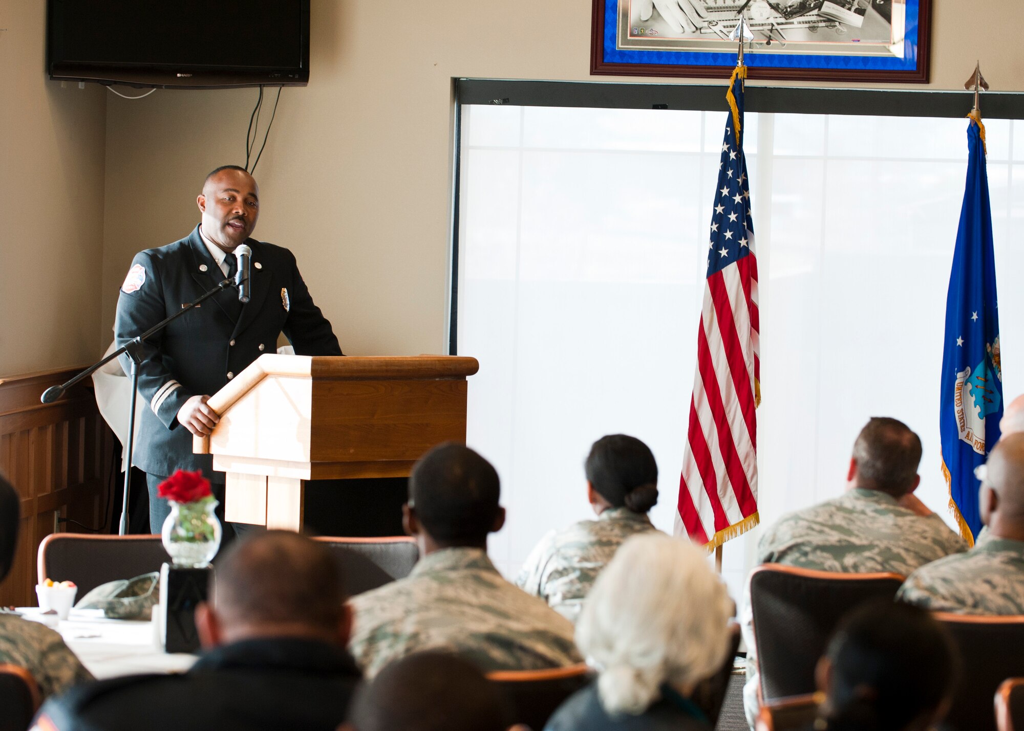 North Las Vegas Fire Department Public Information and Community Liaison Officer, Capt. Cedric Williams, speaks at the Dr. Martin Luther King, Jr. remembrance breakfast at the golf course Jan. 17, 2014, at Nellis Air Force Base, Nev. Williams’s speech paid tribute to Dr. King’s legacy and his contributions to the country’s history. (U.S. Air Force photo by Airman 1st Class Thomas Spangler)