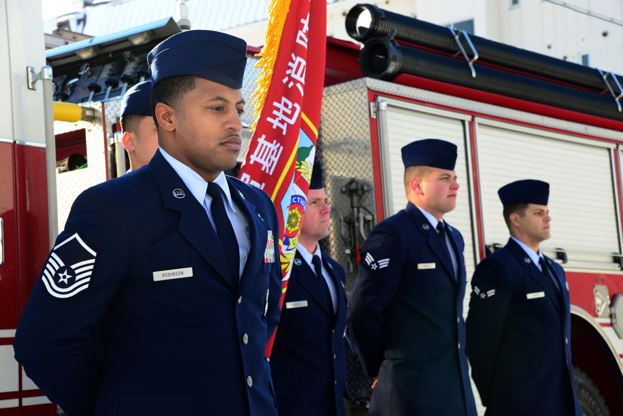 Master Sgt. Daniel Robinson, 35th Civil Engineer Squadron assistant fire chief of operations, leads his four-person team in a vehicle equipment inspection during the annual Misawa City New Year ceremony Jan. 19, 2014. Misawa Air Base and local firefighters gather to participate in the ceremony. (U.S. Air Force photo by Tech. Sgt. April Quintanilla)
