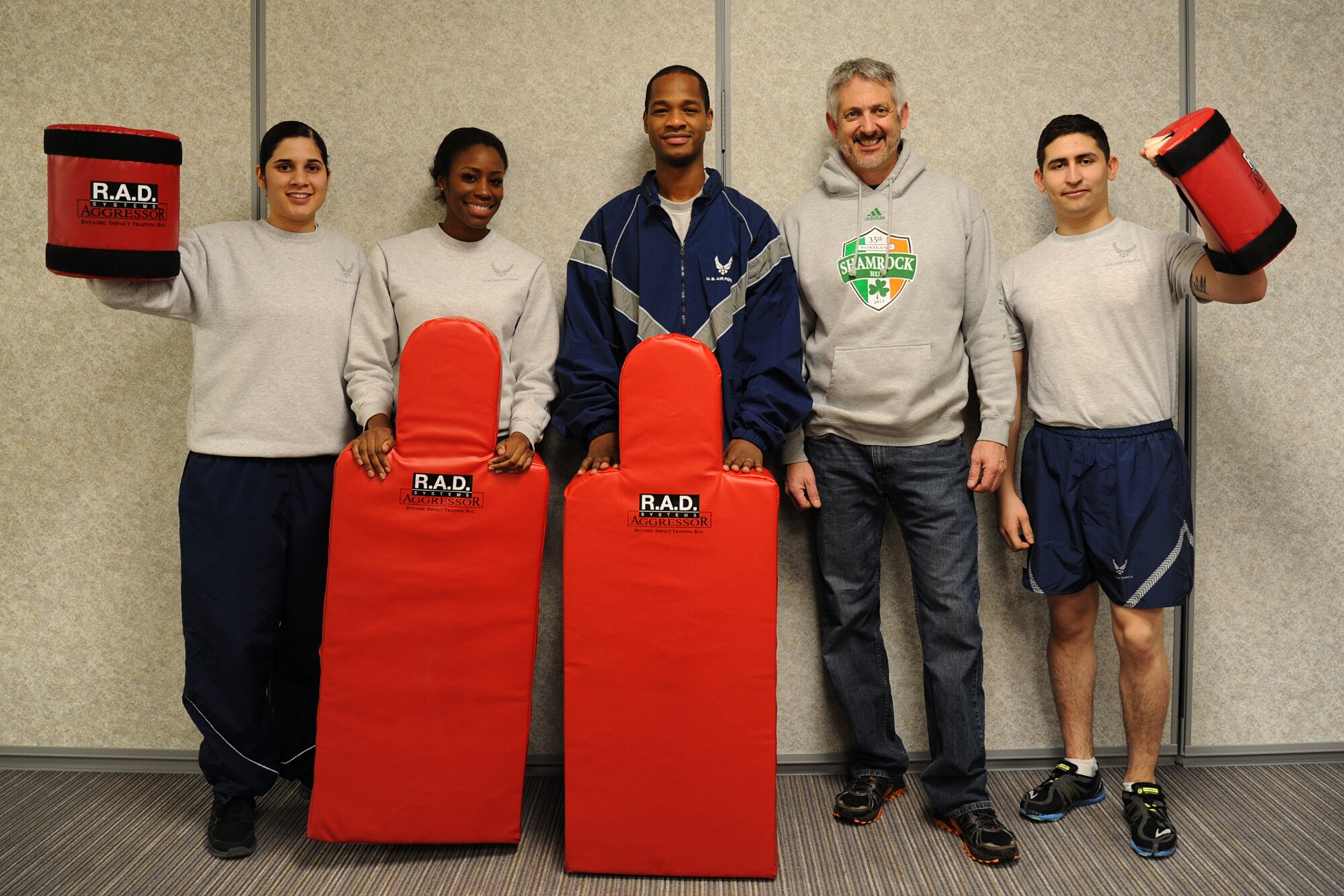 Rape Aggression Defense instructors pose for a photo after conducting the first RAD course at Fairchild Air Force Base, Wash., Jan. 16, 2014. RAD is a two-day training course where the instructors teach women how to defend themselves from aggressors. (U.S. Air Force photo by Airman 1st Class Janelle Patiño/ Released)