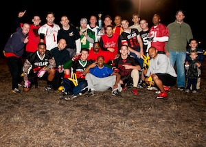 Football players from the 628th Civil Engineer Squadron celebrate after winning Intramural Flag Football Championship, Jan. 17, 2014 at Joint Base Charleston – Air Base, S.C. CES beat the 628th Force Support Squadron 13-12 to win back-to-back championships. (U.S. Air Force photo/Staff Sgt. William O’Brien)