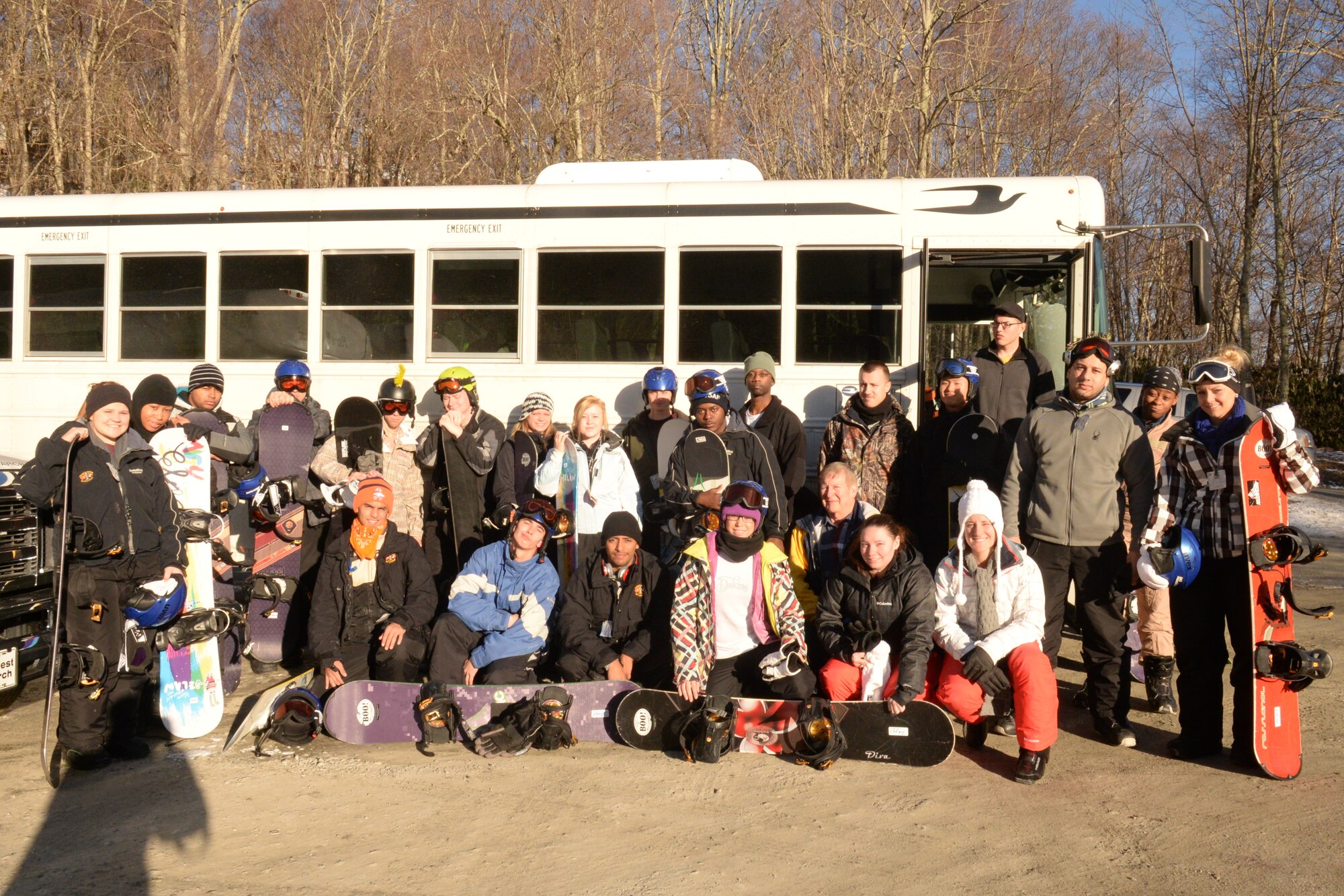 The single E4 and below chapel ski trip attendees pose for a photo before hitting the slopes at Sugar Mountain Ski Resort, Boone, N.C., Jan. 20, 2014. The Airmen spent two days on the slopes learning about resiliency and bouncing back from traumatic experiences. (U.S. Air Force photo by Airman 1st Class Jonathan Bass/Released)