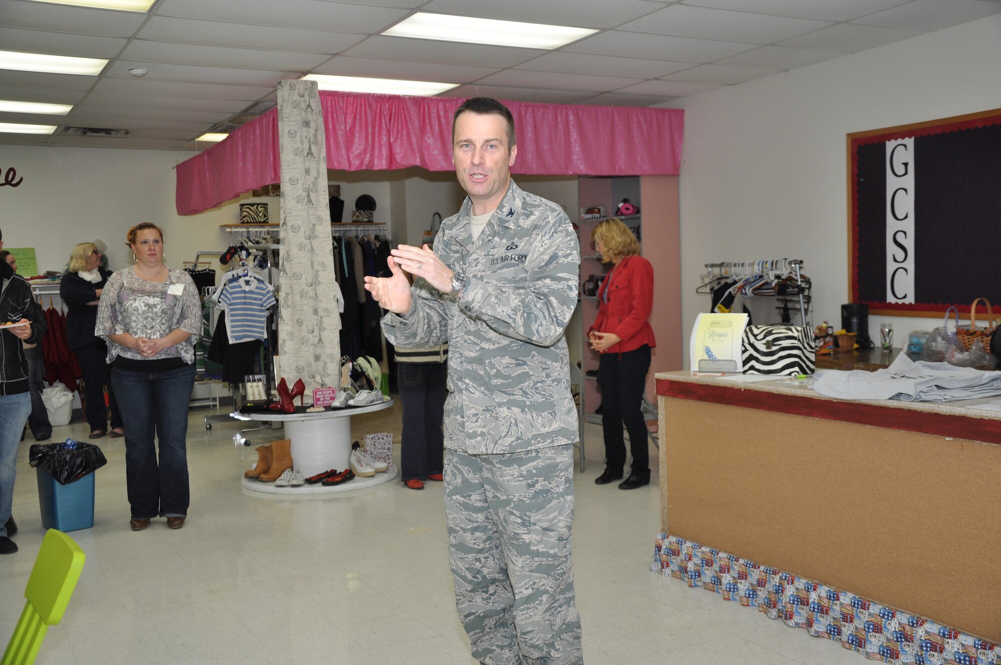 GOODFELLOW AIR FORCE BASE, Texas – Col. Thomas Schmidt, 17th Training Wing Vice Commander, speaks with Goodfellow Combined Spouses’ Club members and guests during the SAMS Thrift Store grand opening Jan. 16. Schmidt gave thanks to the patience of the GCSC members during the moving and upgrading process of the thrift store. (U.S. Air Force photo/ Airman 1st Class Breonna Veal)