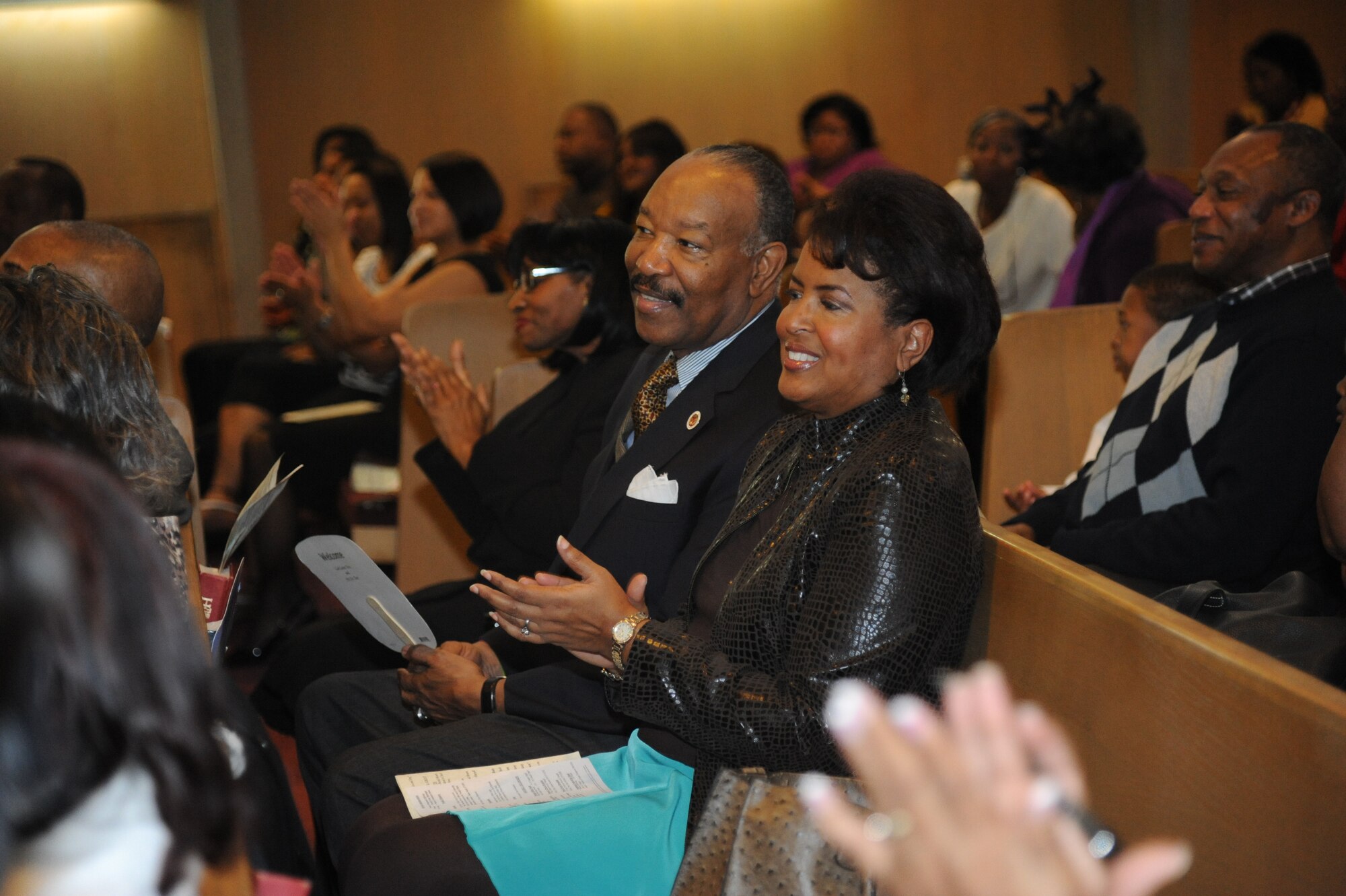 Dorothy Roberts, daughter of Tuskegee Airman, Lawrence Roberts, applauds during the Martin Luther King Jr. Commemorative Worship Service Jan. 19, 2013, at the Larcher Chapel, Keesler Air Force Base, Miss.  The Larcher Chapel Gospel Service dedicated the celebration to King, an iconic leader in the advancement of the African-American Civil Rights Movement.  (U.S. Air Force photo by Kemberly Groue)
