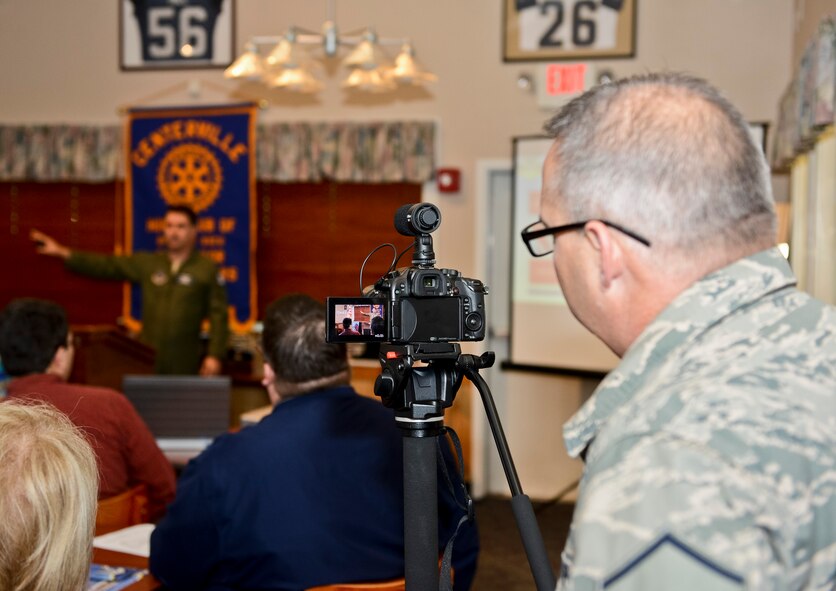 U.S. Air Force Master Sgt. Roger Parsons, 116th Public Affairs, Georgia Air National Guard, videos a community relations event with the Centerville Rotary Club, Warner Robins, Ga., Jan. 14, 2014.  Members of the Rotary Club received information about the mission and successes of the Joint STARS 116th Air Control Wing, stationed at Robins Air Force Base, Ga., and the Georgia National Guard.  (U.S. Air National Guard photo by Tech. Sgt. Regina Young/Released)