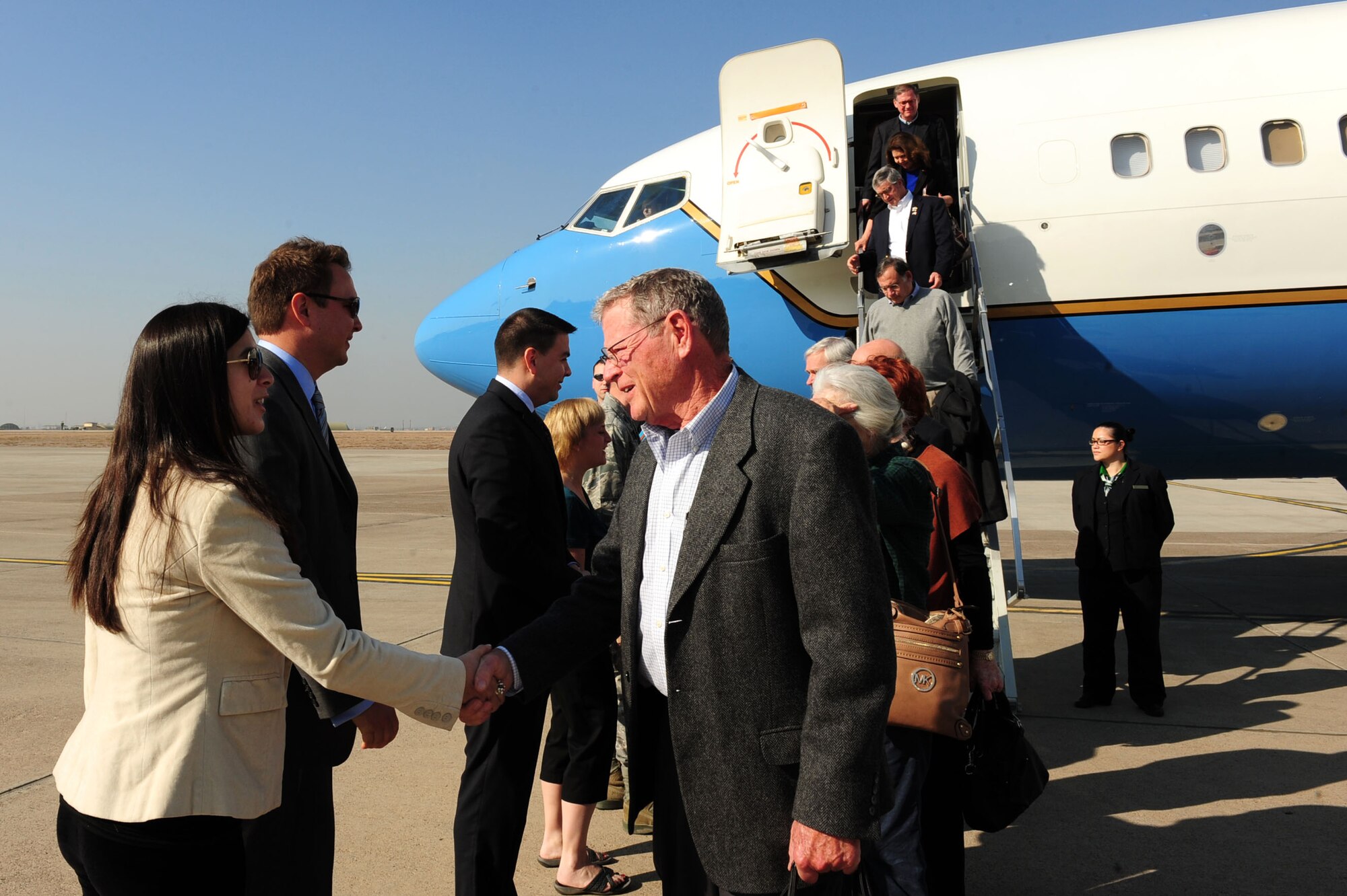 Leaders from the 39th Air Base Wing and the U.S. Consulate Adana, await the arrival of Jim Inhofe, Oklahoma senior senator Jan. 18, 2013, at Incirlik Air Base, Turkey. Senators James Inhofe, Okla. senior senator, John Boozman, Ark. senator, Ander Crenshaw and Representatives Vern Buchanan, both Fla. representatives, Ann Kirkpatrick Ariz. representative and Steve Pearce, N.M. representative and their spouses enjoyed a tour here. (U.S. Air Force photo by Airman 1st Class Nicole Sikorski/Released) 