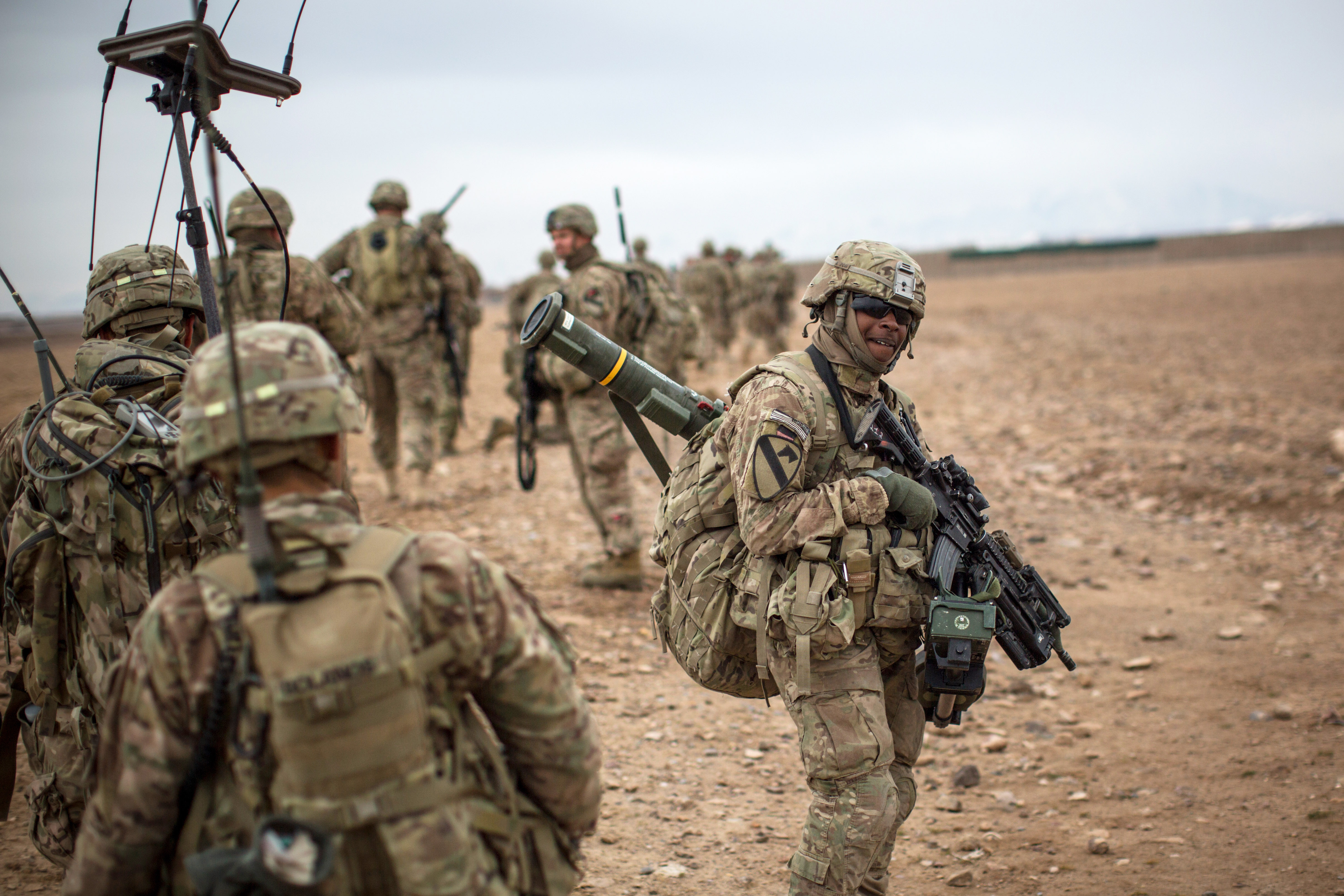 U.S. soldiers patrol around Tarin Kowt, Afghanistan, Jan. 11, 2014.
