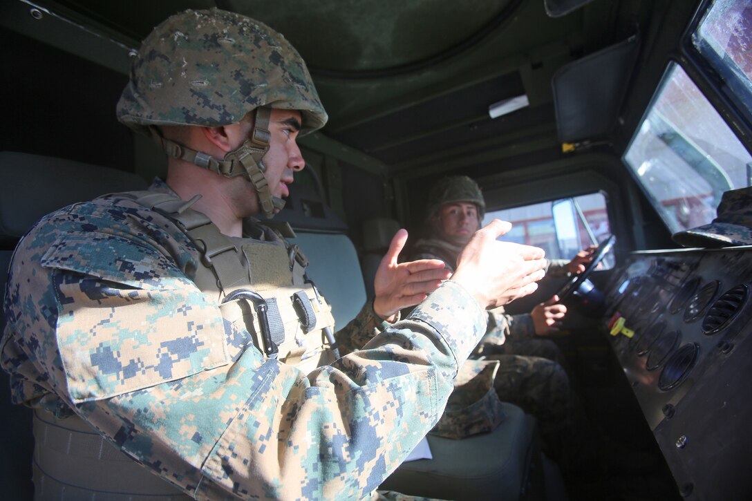Lance Cpl. Andres Cornejo, a semitrailer refueler operator with General Service Motor Transportation Company, Combat Logistics Regiment 1, 1st Marine Logistics Group, provides instruction to Lance Cpl. Ary Leura, a student driver with CLR-1, 1st MLG, during the Semitrailer Refueler Operator’s Course aboard Camp Pendleton, Calif., Jan. 16, 2014. Each refueler holds approximately 4,900 gallons of fuel, providing forward Marine Corps units with an increased range of operations in a combat environment or during humanitarian missions by allowing them to travel longer distances and keep utility equipment operating. Cornejo is a native of San Antonio, Texas. 
