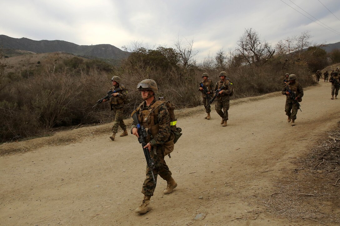 Marines with Infantry Training Battalion, 1st Platoon, Bravo Company patrol the hills of Camp Pendleton as part of their Battle Skills Readiness Exercise Jan. 21. The BSRE is a three-day exercise that allows Marines to apply the skills they learned during their training cycle.
