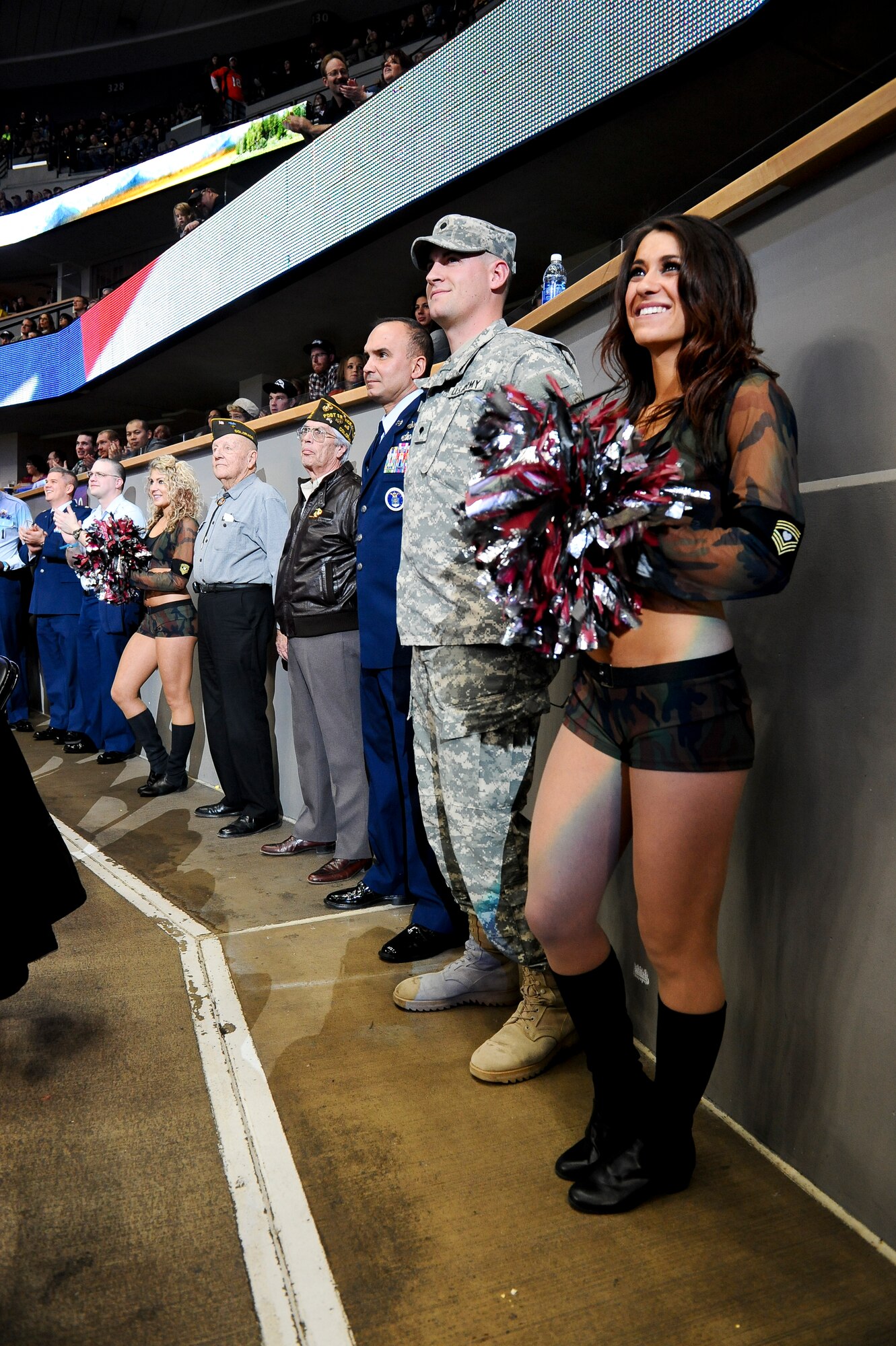 Veterans of foreign wars are recognized for their service during the Colorado Mammoth Lacrosse Military Appreciation Night Jan. 18, 2014, at the Pepsi Center in Denver. More than 17,000 fans attended the Colorado Mammoth Military Appreciation Night where service members were honored and thanked for service to their country. (U.S. Air Force photo by Senior Airman Phillip Houk/Released)
