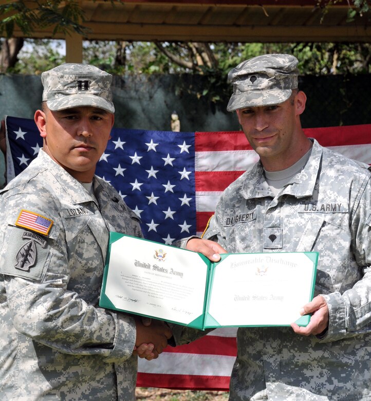 Sgt. Quaterius Johnson and Spc. Robert Daugherty re-enlisted in the United States Army during a ceremony conducted at Soto Cano Air Base, Honduras, January 22. Both Johnson and Daugherty are members of Army Forces Batallion, Joint Task Force-Bravo. (Photos by Ana Fonseca)