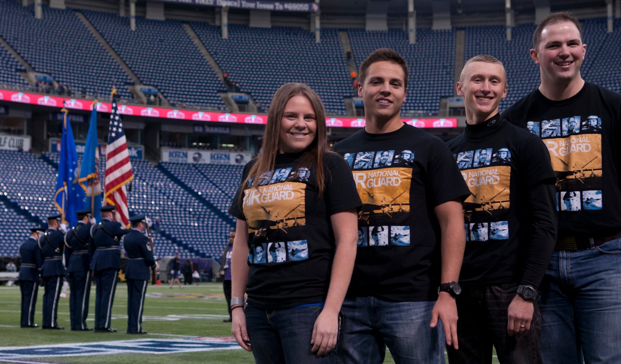 Airmen 1st Class Audrey Mueller, left, Joe Fonseca, Tanner Johnson, and Brian Willis, 133rd Security Force Squadron, pose for a photograph at the Mall of America Field in Minneapolis, Minn., Dec. 1, 2013. The Airmen are going to take part in an oath of enlistment ceremony before the Minnesota Vikings verses the Chicago Bears game.
(U.S. Air National Guard photo by Tech. Sgt. Amy M. Lovgren/Released)
