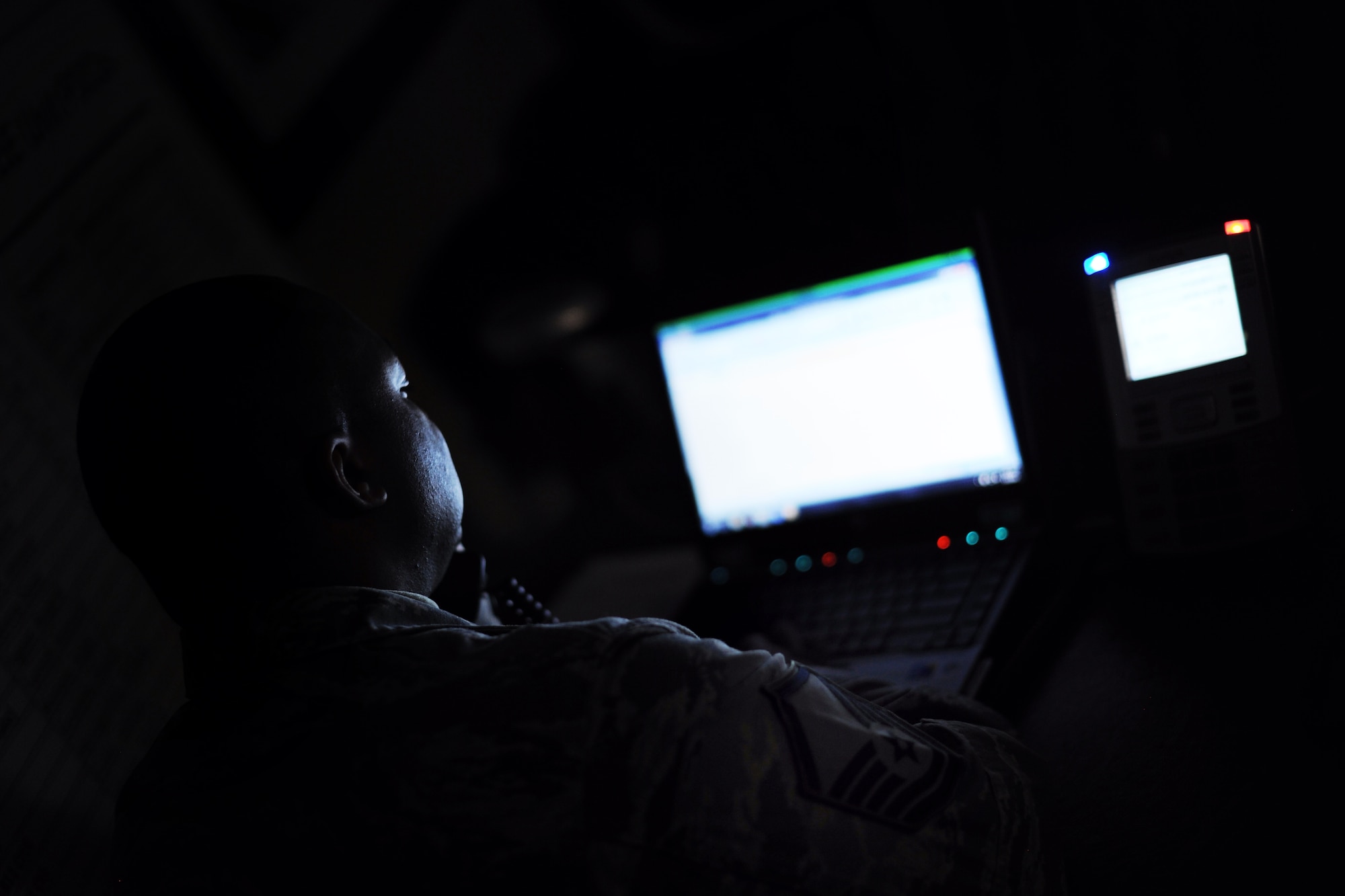 Master Sgt. Curtis Conyers provides support for the migration to DoD Defense Enterprise Email here Jan. 15, 2014. DEE creates a common platform for the DoD, allowing military members regardless of branch, geographical location or unit to easily find and communicate with each other without knowing the exact suffix attached to their email. Curtis is a project manager with the 744th Communication Squadron. (U.S. Air Force photo/Airman 1st Class Aaron Stout)