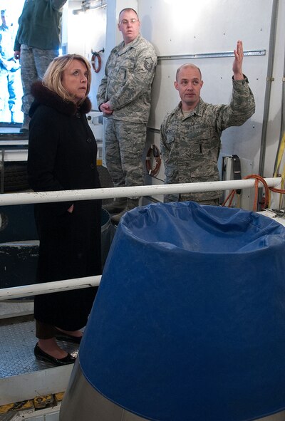 140121-F-JW079-163 Secretary of the Air Force Deborah Lee James asks Staff Sgt. Daniel Ashcroft, 90th Maintenance Operations Squadron Training Flight, about a maintainer’s job and the functions of a payload transport vehicle Jan. 21, 2014. James and Chief Master Sgt. of the Air Force James Cody, left, visited the 20th Air Force and 90th Missile Wing on F.E. Warren Air Force Base, Wyo., to learn about the Minuteman III weapon system and the Airmen who operate, maintain, secure and support it. (U.S. Air Force photo by R.J. Oriez)