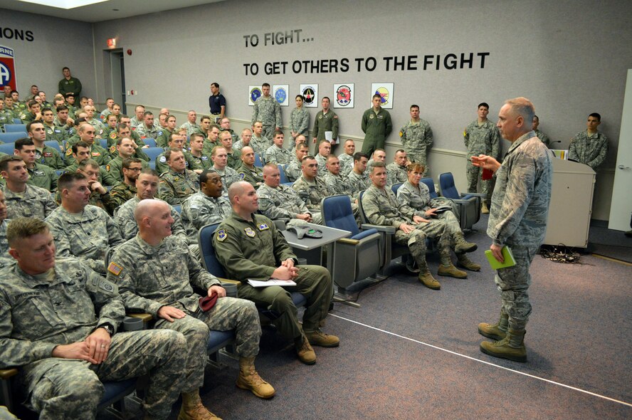 Air Force Maj. Gen. Rick Martin, U.S. Air Force Expeditionary Center commander, provides comments to airmen and soldiers during a joint mission briefing for joint exercise Global Response Expeditor on Jan. 15, 2014, at Pope Army Airfield, Fort Bragg, N.C. The purpose of this exercise was to prepare United States Transportation Command units, Air Mobility Command forces and elements of the XVIII Airborne Corps to respond as part of the Global Response Force and to conduct Joint Forcible Entry operations. This exercise executed Joint Forcible Entry operations in support of a combined Joint Task Force utilizing drop zones at the Joint Readiness Training Center, Fort Polk, La. Air mobility aircraft and crews airdropped approximately 1,124 paratroopers and offloaded more than 120 short tons of cargo. (U.S. Air Force photo/Marvin Krause)