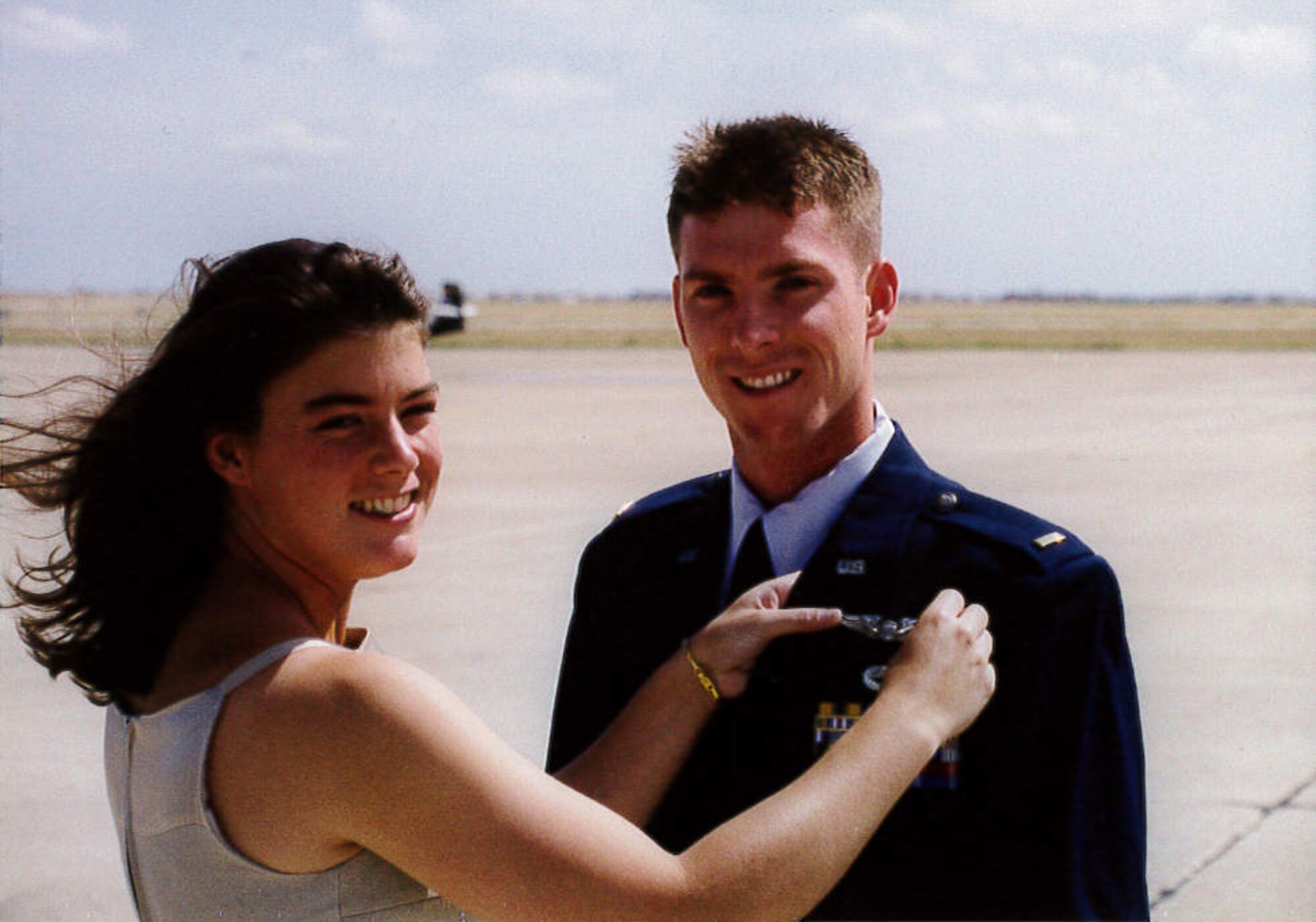 Nicole Woolford pins on her husband then 2nd Lt. Jeffrey Woolford’s pilot wings. Woolford joined the Air Force as a crew chief in 1989 and commissioned as an A-10 Thunderbolt II pilot nine years later. He credits his wife to much of his success in his career. Maj. Woolford is currently a student at Johns Hopkins University studying for his Master’s Degree in Public Health. He is attending the school through Air University’s Air Force Institute of Technology. (U.S. Air Force courtesy photo)