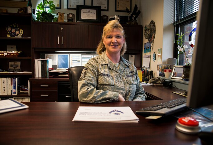 Senior Master Sgt. Michelle McMeekin, Career Assistance Advisor at Joint Base Charleston, sits at her desk Jan. 14, 2014 at JB Charleston, S.C. Career Assistance Advisors help answer common questions that Airmen may have, such as retraining program requirements, making informed decisions on what path to take for a career, re-enlistment questions, and now, questions about the force management downsizing.