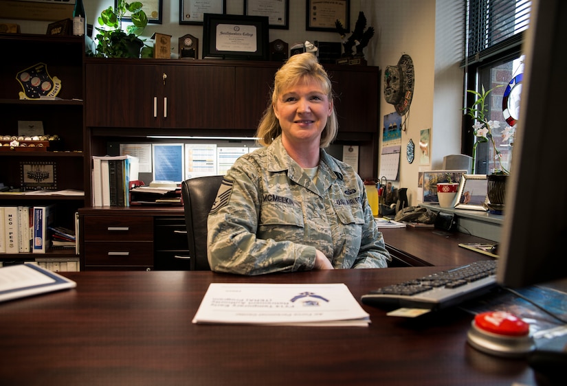 Senior Master Sgt. Michelle McMeekin, Career Assistance Advisor at Joint Base Charleston, sits at her desk Jan. 14, 2014 at JB Charleston, S.C. Career Assistance Advisors help answer common questions that Airmen may have, such as retraining program requirements, making informed decisions on what path to take for a career, re-enlistment questions, and now, questions about the force management downsizing.