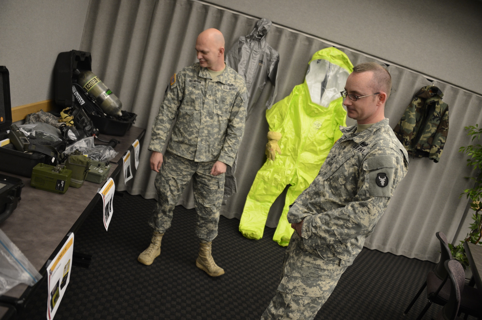 Soldiers from the Minnesota Army National Guard tour the many pieces of equipment on display during the Mobile Emergency Operations Center Open House at the 133rd Airlift Wing in Saint Paul, Minnesota.  
(U.S. Air National Guard photo by Tech. Sgt. Lynette Olivares/Released)

