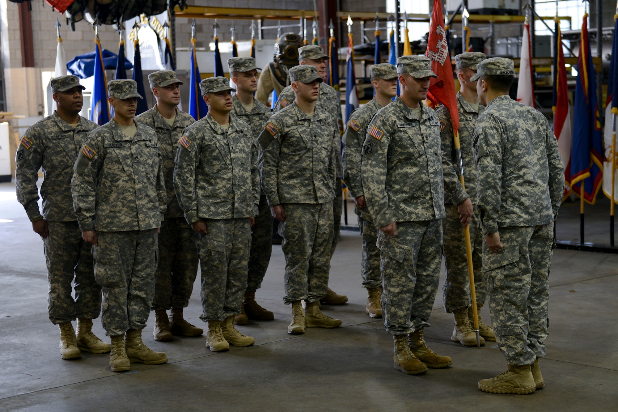 Members of the 511th Engineer Dive Detachment stand in formation during a deployment ceremony at Fort Eustis, Va., Jan. 18, 2014. The unit will deploy in support of Operation Enduring Freedom.(U.S. Air Force photo by Staff Sgt. Ciara Wymbs/Released)