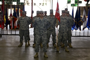 Soldiers assigned to the 511th Engineer Dive Detachment stand in formation during a deployment ceremony at Fort Eustis, Va., Jan. 18, 2014. The unit left for a deployment in support of Operation Enduring Freedom. (U.S. Air Force photo by Staff Sgt. Ciara Wymbs/Released) 