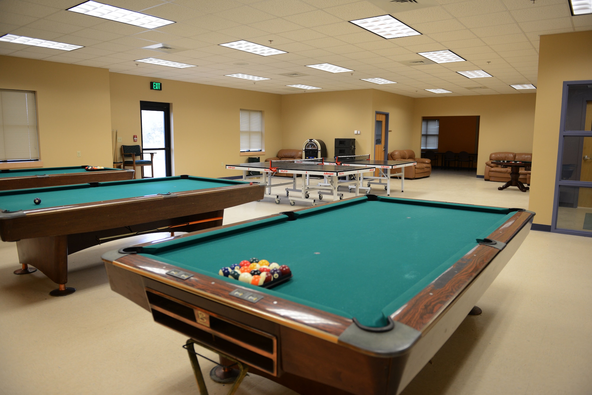 At the new Community Commons at Langley Air Force Base, Va., patrons can now participate in recreational activities such as billiards and table-tennis. New classes for the building will include quilting, sewing, scrapbooking, photography and videography, with cooking and baking classes in the future. (U.S. Air Force photo by Airman 1st Class Kimberly Nagle/Released)