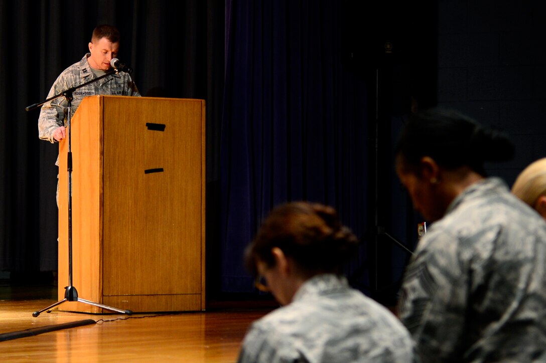 U.S. Air Force Capt. Christopher Underwood II, 633rd Air Base Wing chaplain, performs the invocation during the Martin Luther King Jr. Day ceremony at Langley Air Force Base, Va., Jan. 17, 2014. The holiday, which celebrates the sacrifices made by King, is celebrated on the third Monday of January each year. (U.S. Air Force photo by Airman 1st Class Areca T. Wilson/Released)