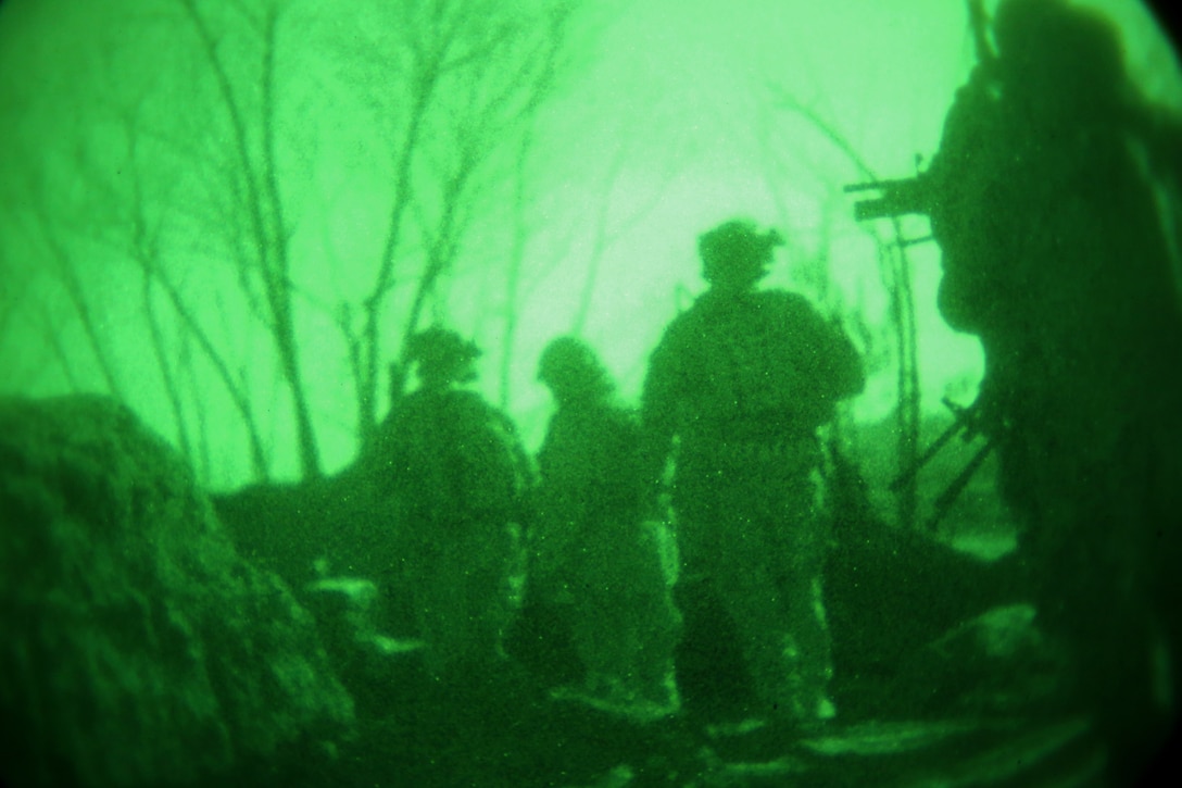 As seen through a nightvision device, Afghan commandos and U.S