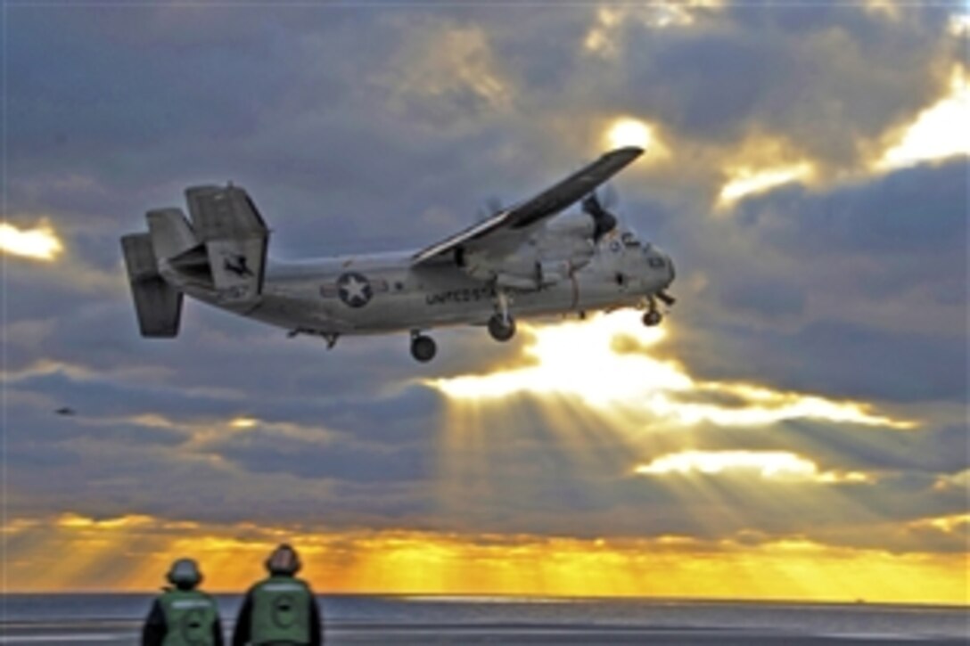 A C-2A Greyhound takes off from the flight deck of the USS Theodore Roosevelt in the Atlantic Ocean, Jan. 18, 2014. The Theodore Roosevelt is underway conducting carrier qualifications. The Greyhound is part of the Rawhides of the Fleet Logistics Support Squadron 40. 