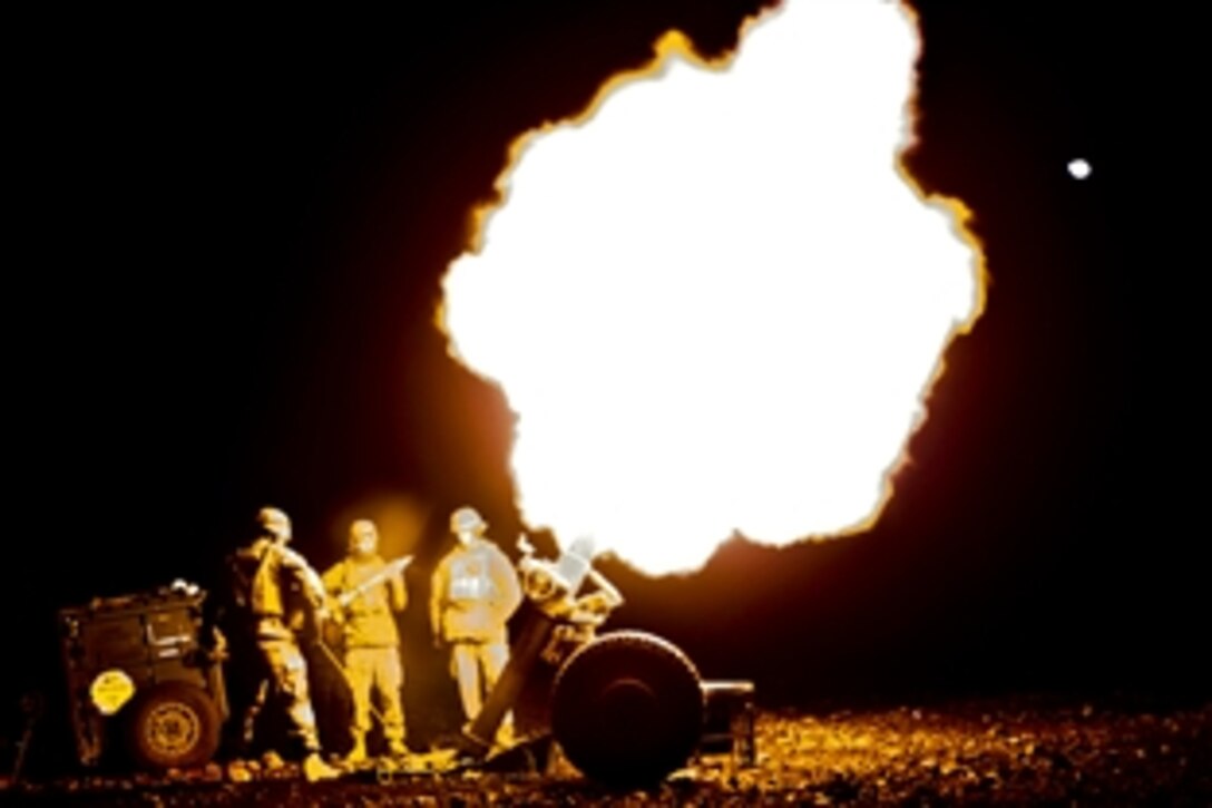 Marines fire an M327 120mm rifle mortar system during evening sustainment training to support operation Lava Viper on Camp Pohakuloa, Hawaii, Jan. 20, 2014. 
