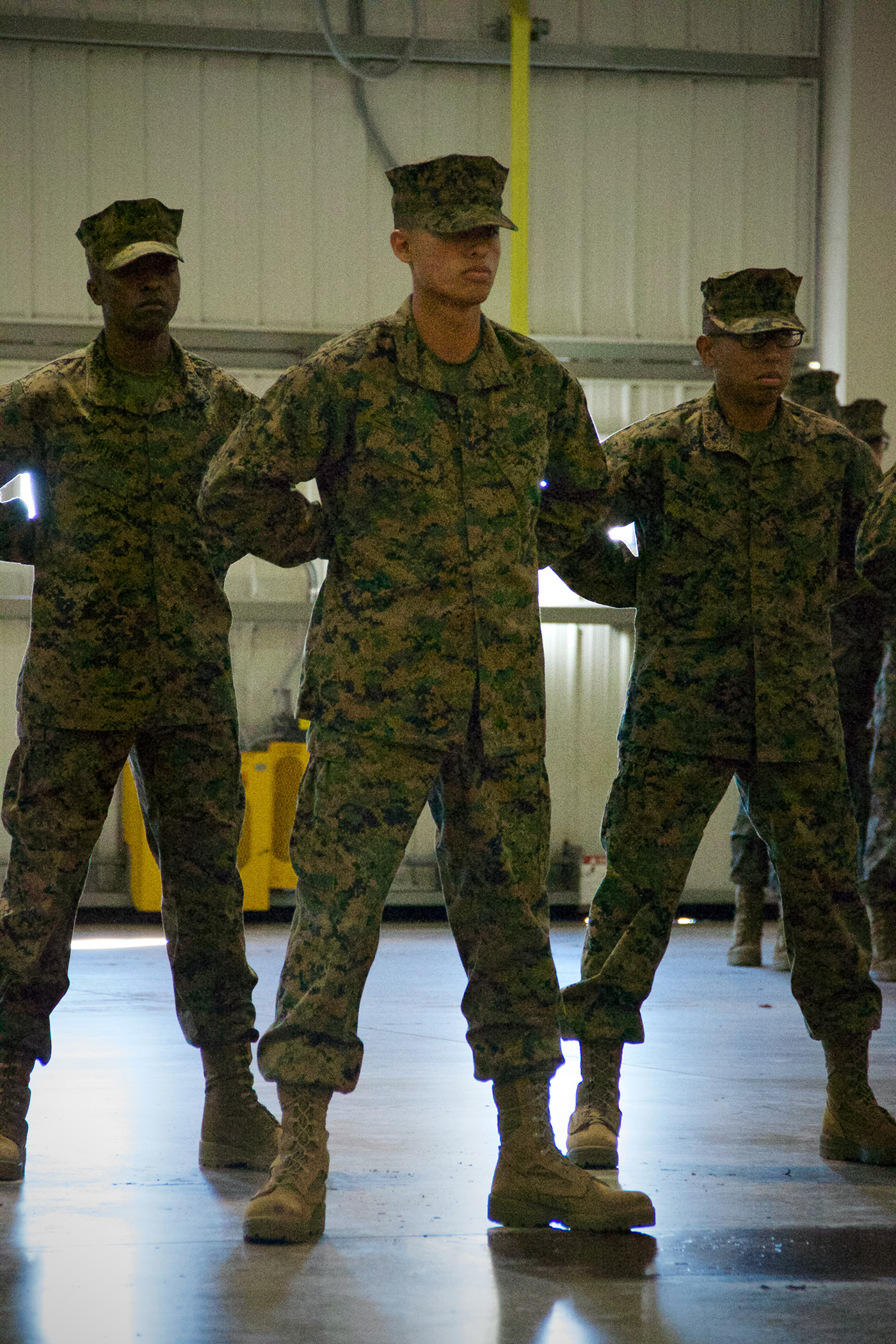 Marine Corps Pfc. Sebastian Garcia from Hialeah, Fla., earns his United States Citizenship Jan. 16, 2014 along with nine other immigrants who are graduating from recruit training on Marine Corps Recruit Depot Parris Island, S.C. The Marine Corps instituted the citizenship process at recruit training in October 2012. 