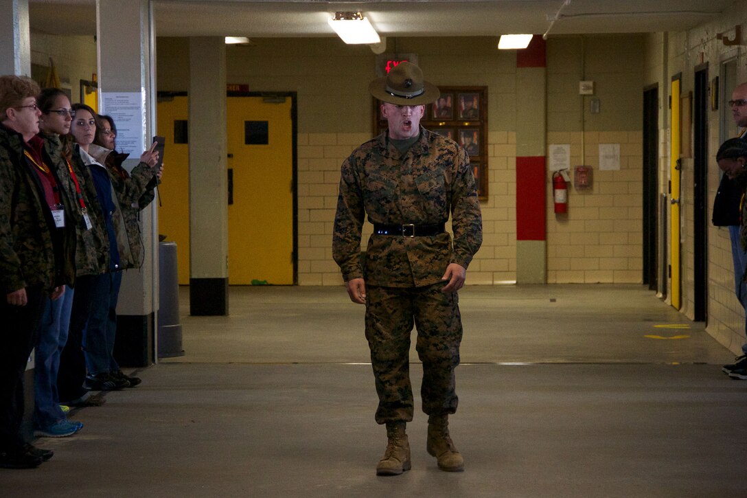 A Drill Instructor with Company F, 2nd Recruit Training Battalion, Recruit Training Regiment, Marine Corps Recruit Deport Parris Island, S.C., welcomes a group of 20 high school educators from south Florida and Puerto Rico Jan. 15, 2014. Each year, hundreds of high school educators participate in the Marine Corps’ Educator’s Workshop to get a deeper understanding of how the Corps makes Marines. 