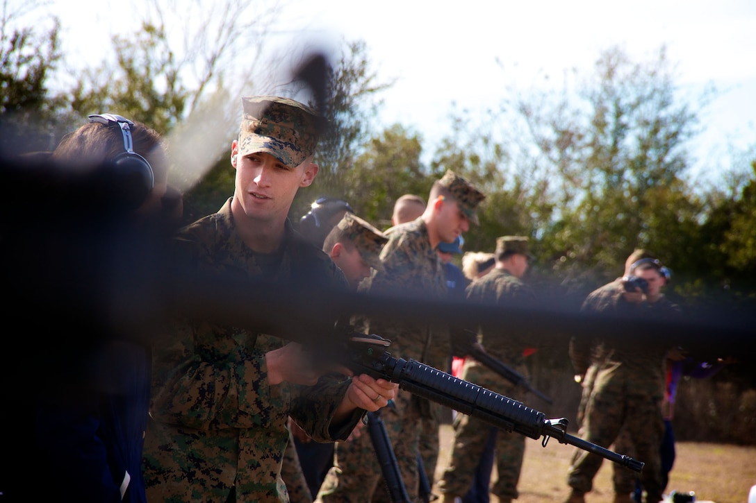 Marines with Weapons and Field Training Battalion, Recruit Training Regiment, Marine Corps Recruit Depot Parris Island, S.C., instruct a group of teachers from south Florida and Puerto Rico on the proper handling and use of the M16A4 Carbine Jan. 15, 2014. Each year, hundreds of high school educators participate in the Marine Corps’ Educator’s Workshop to get a deeper understanding of how the Corps makes Marines. 