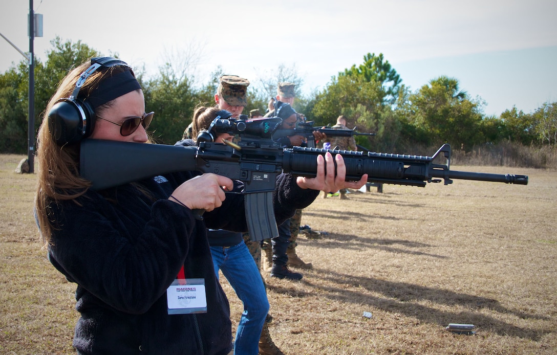 Sara Firestone, a counselor from West Boca Raton High School in Boca Raton, Fla., fires an M16A4 Carbine during a visit to Marine Corps Recruit Depot Parris Island, S.C., Jan. 15, 2014. Each year, hundreds of high school educators participate in the Marine Corps’ Educator’s Workshop to get a deeper understanding of how the Corps makes Marines. 