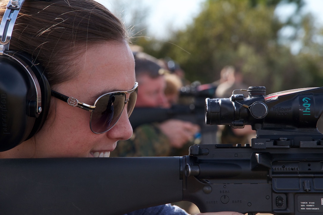 Courtney Sheetz, a teacher from West Boca Raton High School in Boca Raton, Fla., fires an M16A4 Carbine during a visit to Marine Corps Recruit Depot Parris Island, S.C., Jan. 15, 2014. Each year, hundreds of high school educators participate in the Marine Corps’ Educator’s Workshop to get a deeper understanding of how the Corps makes Marines. 