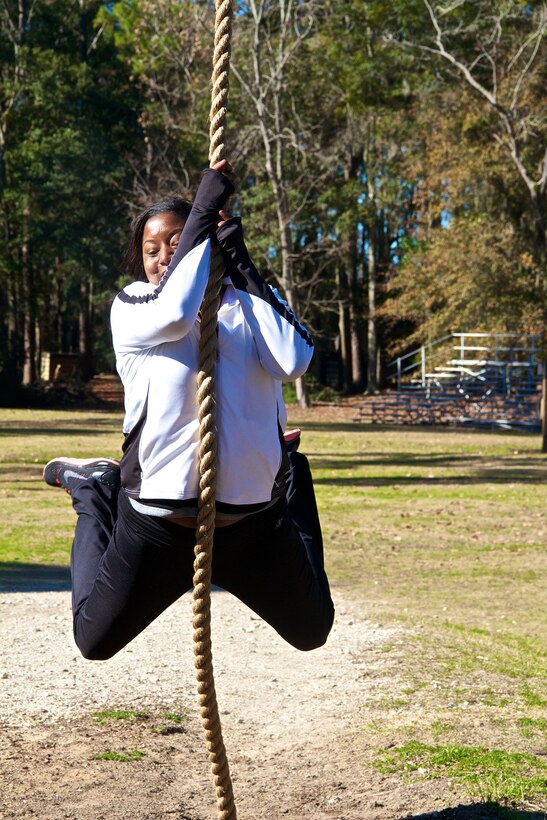 Angela Merritt, a teacher from Dunbar High School in Fort Myers, Fla., completes an obstacle of the confidence course during a visit to Marine Corps Recruit Depot Parris Island, S.C., Jan. 15, 2014. Each year, hundreds of high school educators participate in the Marine Corps’ Educator’s Workshop to get a deeper understanding of how the Corps makes Marines. 
