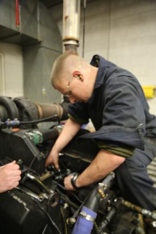 Marines with Ordnance Maintenance Platoon, 13th Combat Logistics Company, 15th Combat Logistics Regiment, 1st Marine Corps Logistics Group, stationed at Marine Corps Air Ground Combat Center Twentynine Palms, Calif., work with civilian mechanics in the engine shop on Production Plant Barstow, to disassemble, repair, and rebuild Assault Amphibious Vehicles, and Light Armored Vehicle engines, Jan 6 - 17.


