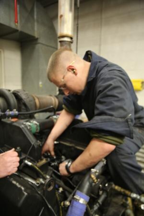Marines with Ordnance Maintenance Platoon, 13th Combat Logistics Company, 15th Combat Logistics Regiment, 1st Marine Corps Logistics Group, stationed at Marine Corps Air Ground Combat Center Twentynine Palms, Calif., work with civilian mechanics in the engine shop on Production Plant Barstow, to disassemble, repair, and rebuild Assault Amphibious Vehicles, and Light Armored Vehicle engines, Jan 6 - 17.


