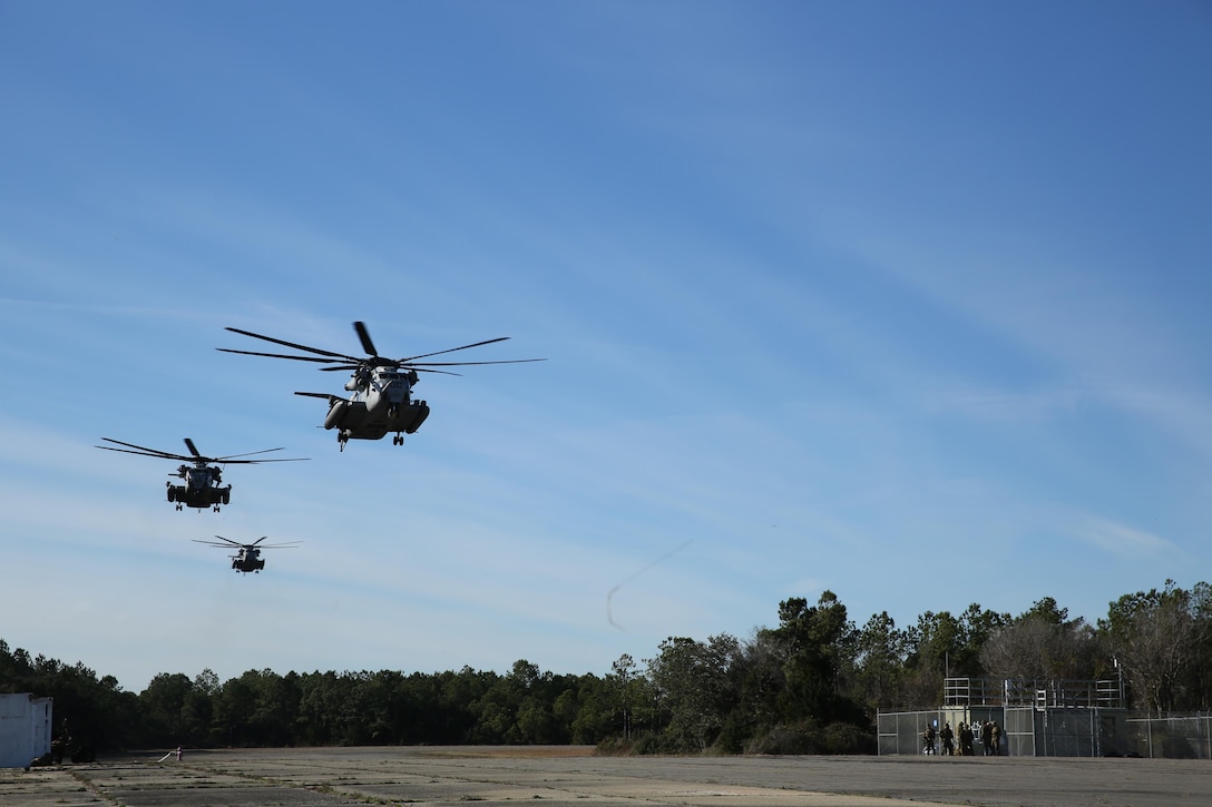 A division of CH-53E Super Stallions begins to land at Marine Corps Outlying Field Atlantic Jan 13. The aircrafts were performing aerial insertion for 3rd Battalion, 6th Marine Regiment. The Super Stallions belong to Marine Heavy Helicopter Squadron 461.


