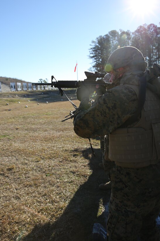 Pfc. Marshall McMillon begins his approach on targets for table three at Marine Corps Air Station Cherry Point’s range Jan. 7. Table three is a moving combat marksmanship course for Marines preparing to deploy. McMillion is an engineer equipment operator with Marine Wing Support Squadron 274.
