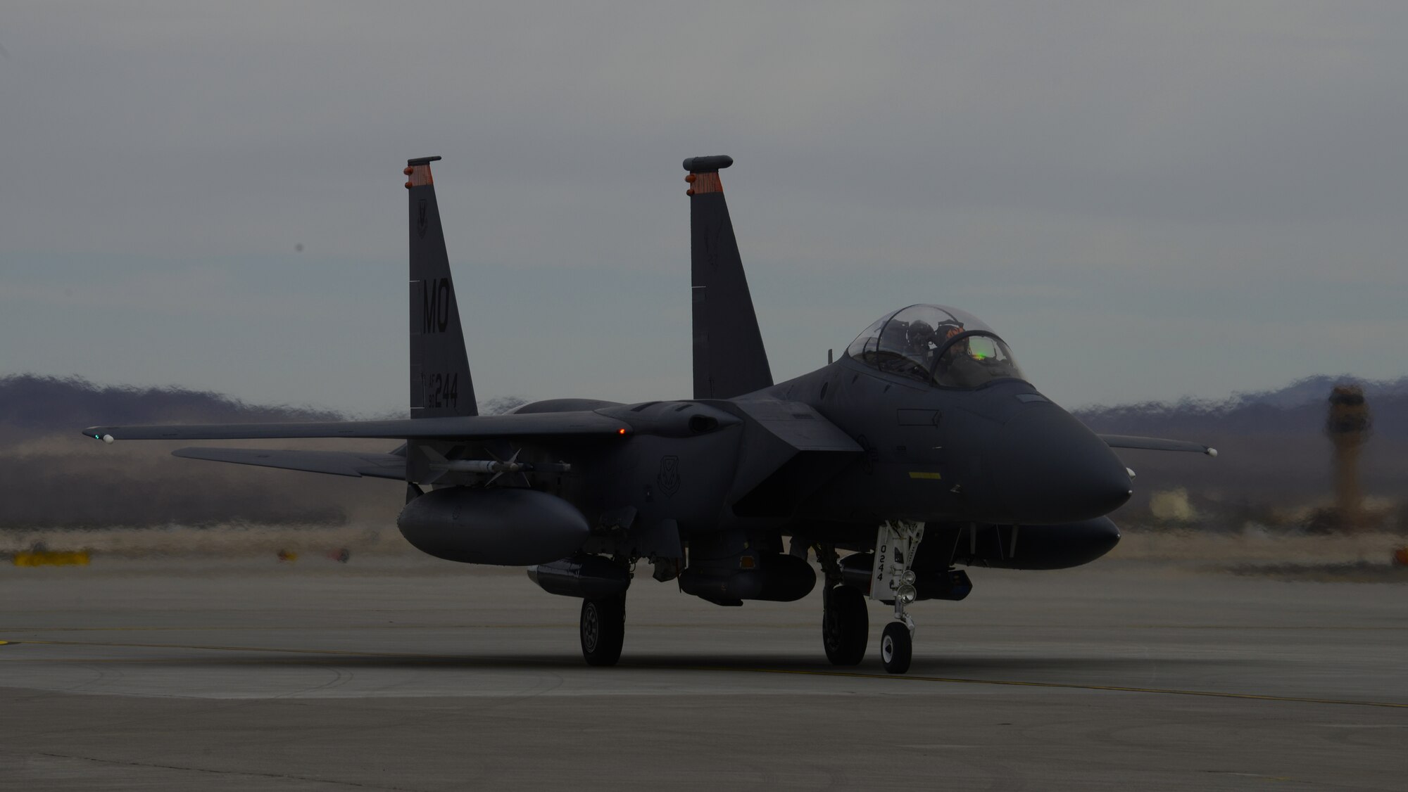 An F-15E Strike Eagle from Mountain Home Air Force Base, Idaho, taxis on the flightline Jan. 23, 2013, at Nellis Air Force Base, Nev. More than eight Bold Tiger aircraft arrived today and will be participating in Red Flag 14-1 throughout the next three weeks. (U.S. Air Force photo by Senior Airman Benjamin Sutton/Released)