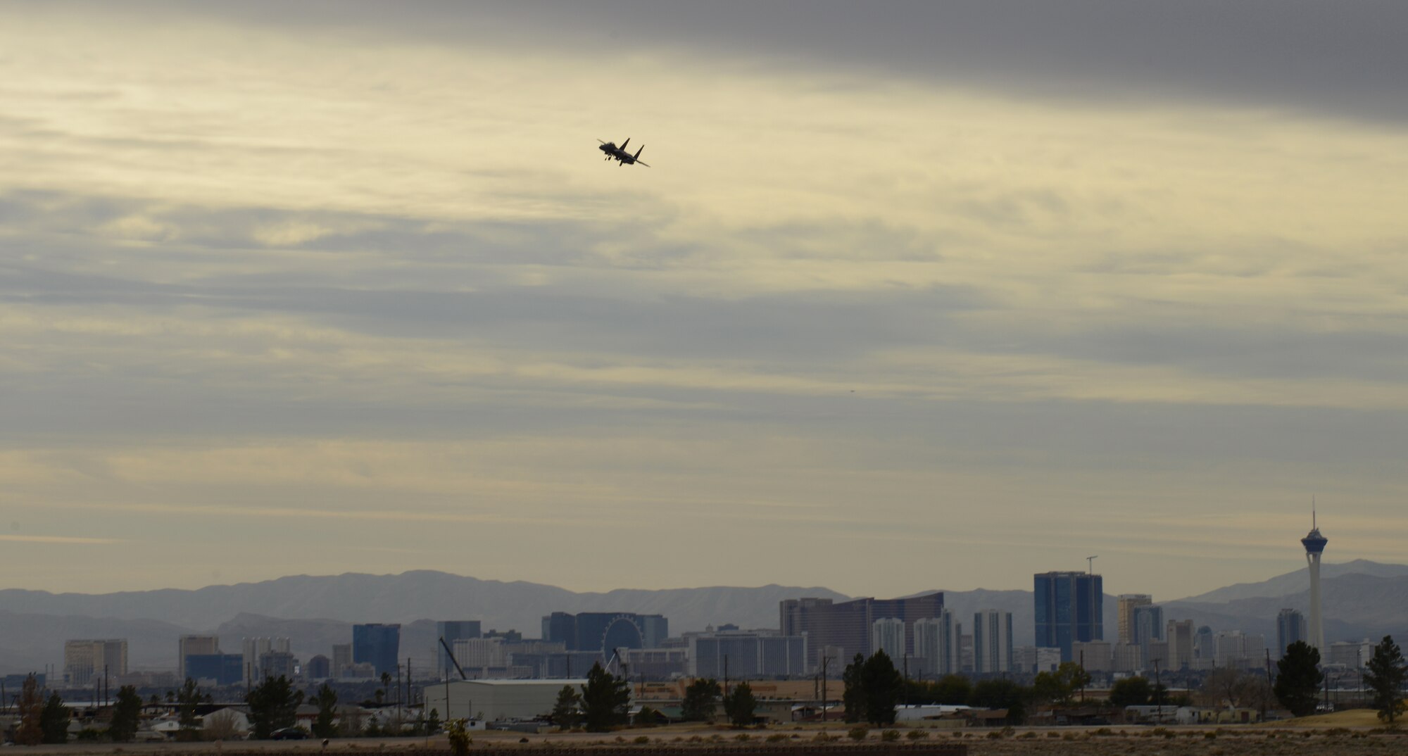 An F-15E Strike Eagle from Mountain Home Air Force Base, Idaho, turns to begin landing Jan. 23, 2013, at Nellis Air Force Base, Nev. Members of the 366th Fighter Wing arrived today and will be participating in Red Flag 14-1 throughout the next few weeks. (U.S. Air Force photo by Senior Airman Benjamin Sutton/Released)