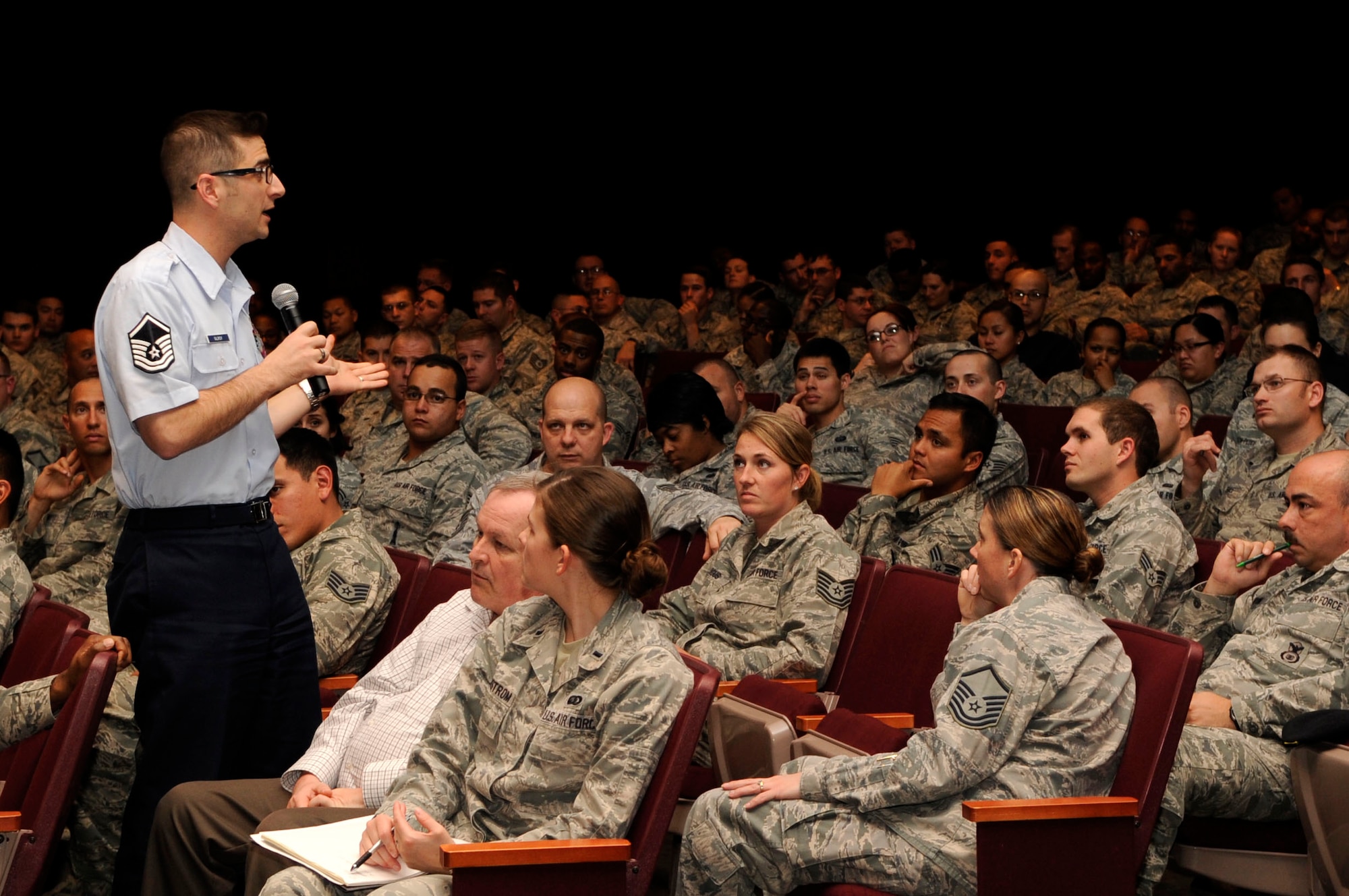 Master Sgt. Nathan Gilroy, Air Force Reserve recruiter, explains the benefits of joining the Air Force Reserve to Airmen during a force reduction briefing here Thursday Jan. 16, 2014. Due to on-going budgetary constraints, the Air Force is currently preparing to trim roughly 25,000 Airmen from its ranks. (U.S. Air Force photo/Senior Airman Shane M. Phipps)