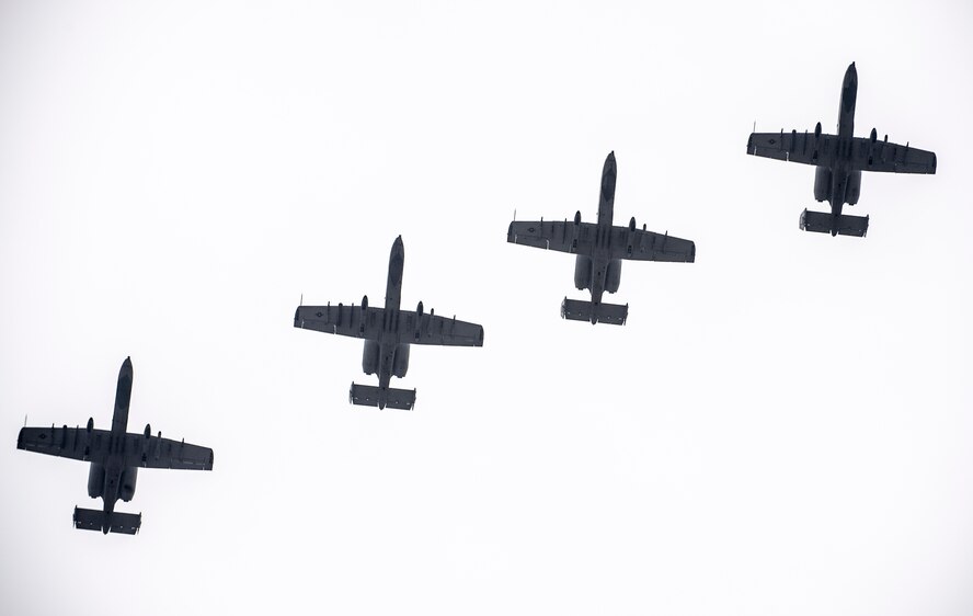 Col. Mark Anderson (Tail No. 188), 188th Fighter Wing commander; Maj. Doug Davis (Tail No. 639), 188th Detachment 1 commander; Col. Brian Burger (Tail No. 613), 188th Operations Group commander; and Capt. Wade Hendrickson (Tail No. 638) conduct a training mission Dec. 30, 2013, over Razorback Range, located at Fort Chaffee Maneuver Training Center, Ark. The photos were captured from a 189th Airlift Wing C-130 Hercules. The sortie was one of the last four-ship training missions that will be conducted at the 188th. The wing is currently transitioning from a fighter mission to an Intelligence, Surveillance and Reconnaissance/remotely piloted aircraft (MQ-9 Reaper) mission that will also feature a space-focused targeting squadron. The 188th has divested two A-10C Thunderbolt II “Warthogs” per month since September 2013. The last Warthog is slated to leave the 188th in June 2014. The 188th has flown A-10s since April 2007 and has had assigned aircraft on site since 1953. June will mark the first time in unit’s 60-year history that no assigned military aircraft will be parked on the flightline at Ebbing Air National Guard Base, Fort Smith, Ark. (U.S. Air Force photo by Senior Airman Matthew Bruch)